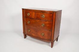 A 19th century bow fronted mahogany chest of drawers.