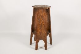 An early 20th century Arts & Crafts Japanese style hardwood stand in the Liberty manner.