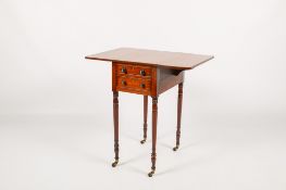 A 20th century mahogany drop leaf table.