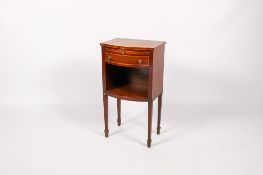 An Edwardian mahogany bow fronted bedside table.