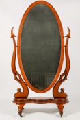 A Victorian mahogany framed cheval mirror.