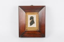 A 19th century silhouette portrait miniature of a Georgian gentleman.