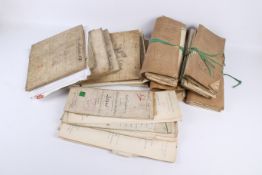 A collection of historical hand written deeds.