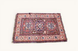 A 20th century Kazak rug.