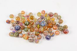 A collection 19th century and later glass 'onion skin' marbles.