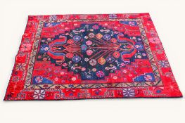 A 20th century Persian rug.
