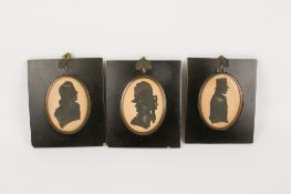 Three 19th century silhouettes.