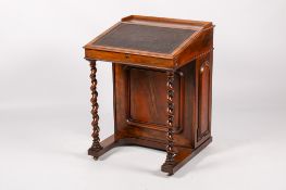 A 19th century rosewood davenport.