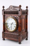 A late 19th century oak cased mantel clock.