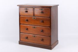An Edwardian mahogany miniature chest of drawers, Two short over three long drawers,