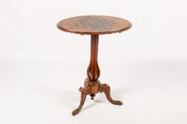 A 19th century inlaid walnut and mahogany tilt top chess table.