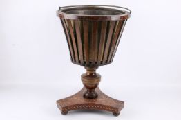 An Edwardian inlaid mahogany jardiniere stand.