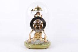 A 20th century Charles Frodsham brass skeleton clock.