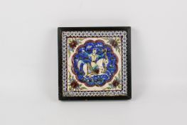 A large 19th century Persian Qajar relief moulded polychrome tile.