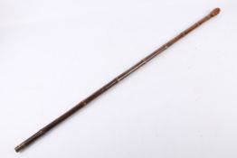 A Victorian bamboo walking cane fitted with a horse measure.