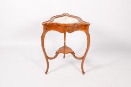 A 20th century walnut bijouterie table display cabinet.