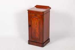 A Victorian mahogany pot cupboard.