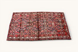 A 20th century Persian rug.