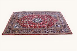 A 20th century Kashan Persian rug.