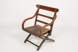 A late Victorian mahogany folding campaign style chair.