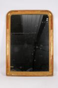 A late 19th French arched gilt framed overmantel wall mirror.