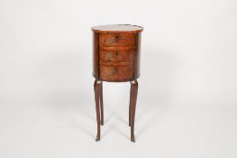 A 19th century Louis XVI style mahogany cylindrical side cabinet.