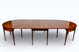 A Victorian mahogany extendable dining table.