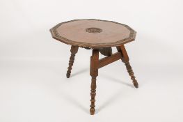 A possibly 18th century carved oak gateleg table.