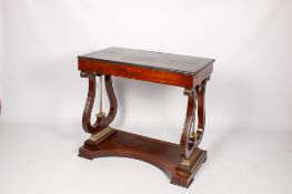 A Victorian mahogany side table.