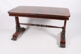A 19th century rosewood sofa table.