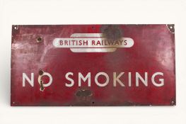 A British Railways enamel 'NO SMOKING' red enamel sign. Featuring a British Railways totem, 30.