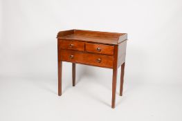 A Georgian mahogany washstand with gallery back.