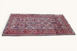 A 20th century Persian rug.