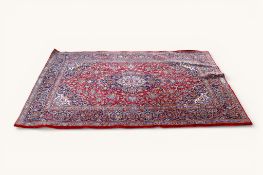 A 20th century Kashan Persian rug.