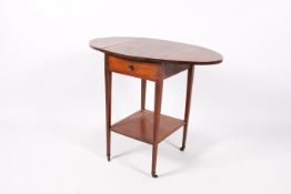 An Edwardian mahogany pembroke table.