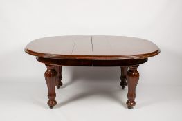 A 19th century mahogany extending dining room table.