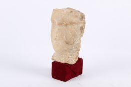 A carved alabaster head.