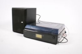 A Neostar record deck with built in tape player also with a Miller & Kreisel subwoofer VX-7 Mk II.