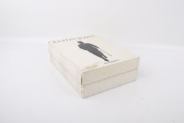 Two 1988 Elton John Collection Sotheby's auction catalogue box sets, vols I - IV. In slip cases.