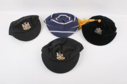A collection of assorted sporting caps