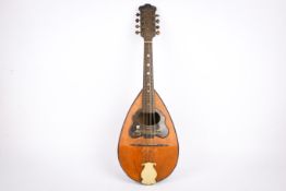 An early 20th century Neapolitan bowl back mandolin labelled Cav. Giovanni de Meglio & Fglio.