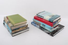 A collection of assorted books mostly related to mountaineering.