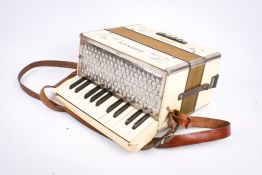 A Hohner Student 8-bass (F-C-G-D) button piano accordion, cased.