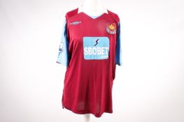 A Carlton Cole match worn West Ham United football shirt no. 12.