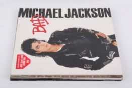 A group of four Michael Jackson and a Janet Jackson LP vinyl records. (5).