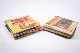 A collection of assorted vintage vinyl LP records mostly 60s and 70s pop.