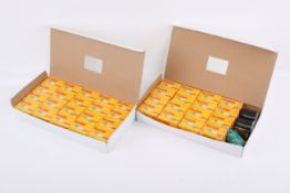 Two boxes of expired 35mm film stock.