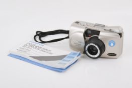 An Olympus Stylus Zoom 115 35mm compact camera. Serial number 6050017.