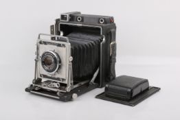 A Graflex Crown Graphic 4x5 large format camera. Serial number 924065. With a Graflex 135mm f4.