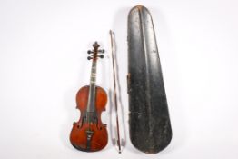 A 19th century violin labelled 'Antonius Straduarius Cremona 1690' in an ebonized wooden cased.